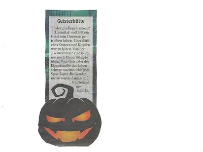 Ghostly hut with carved pumpkin face, German text describing its haunted history. | © Kleine Zeitung, Oktober 2022
